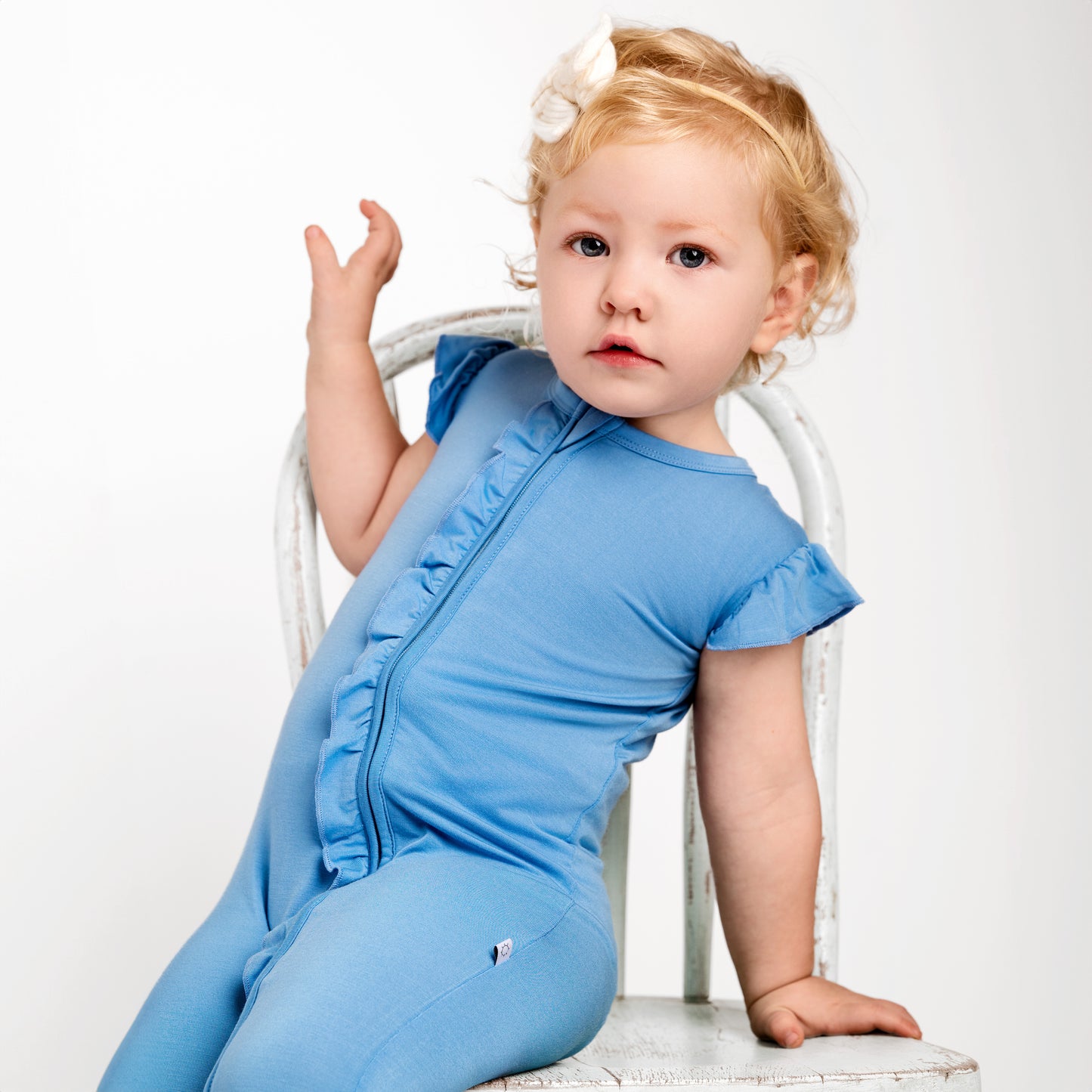 Azure Ruffle Zippy Romper